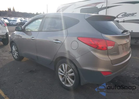 2012 Hyundai Tucson Limited z USA, uszkodzony, nr VIN KM8JU3AC7CU522152